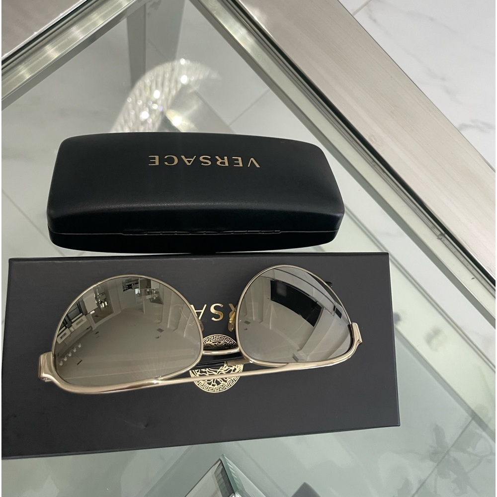VERSACE Pale Gold women sunglasses are an elegant look for a beautiful sunny day